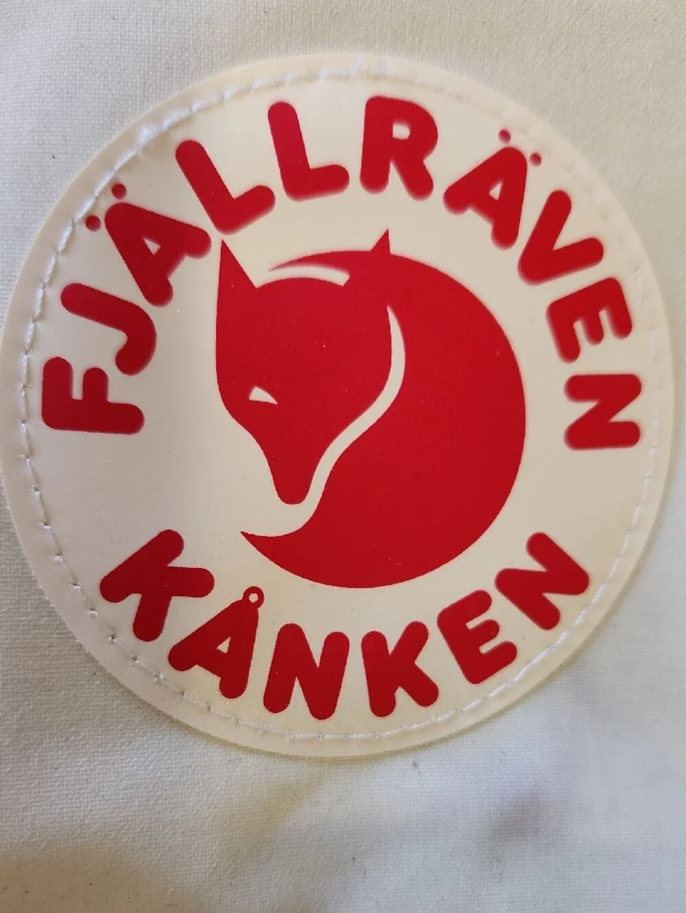 Fjallraven Kanken Backpack in Cream with Red Logo Patch